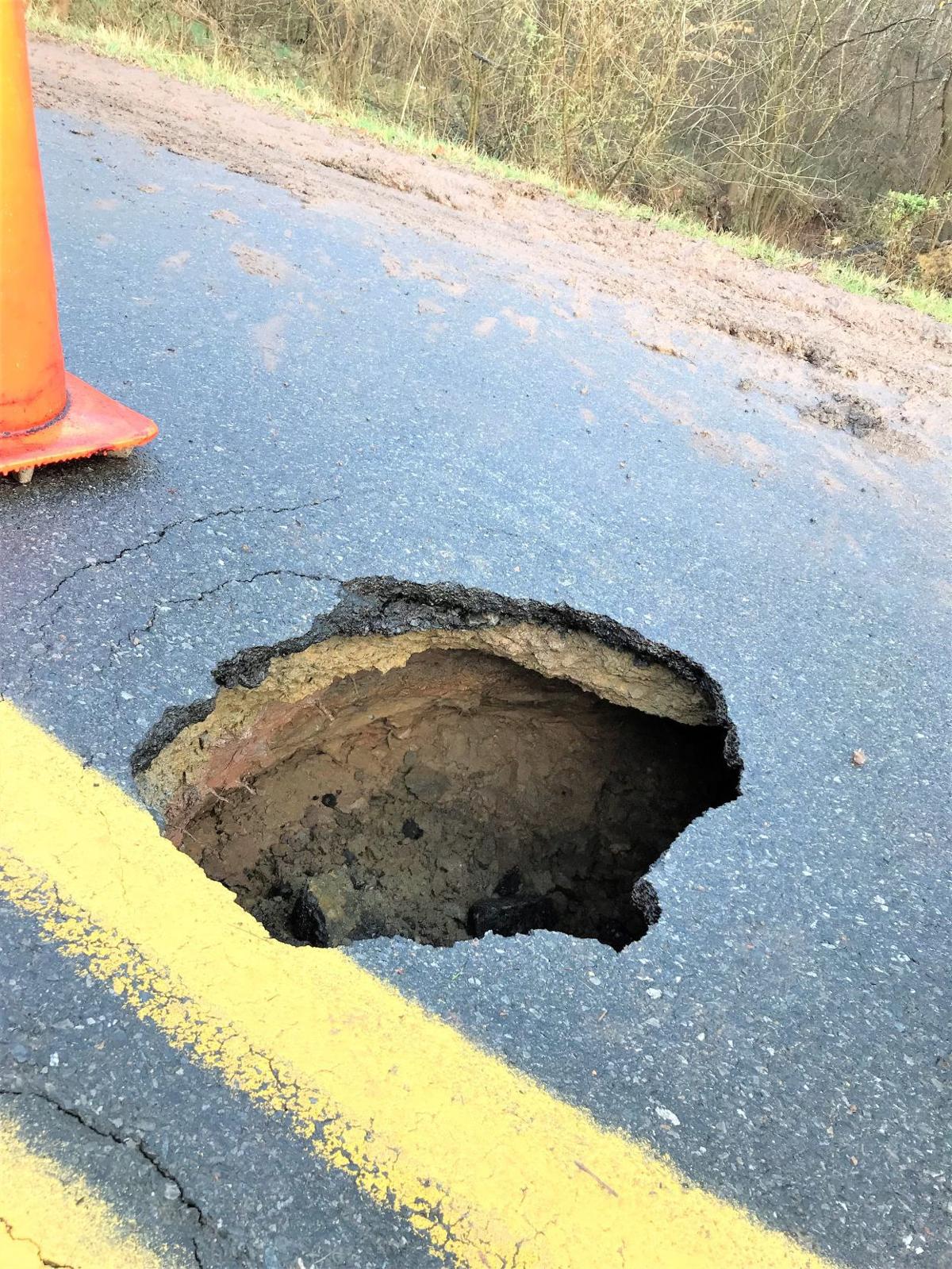 Sinkhole closes River Road near Settle Bridge Road in Stoneville