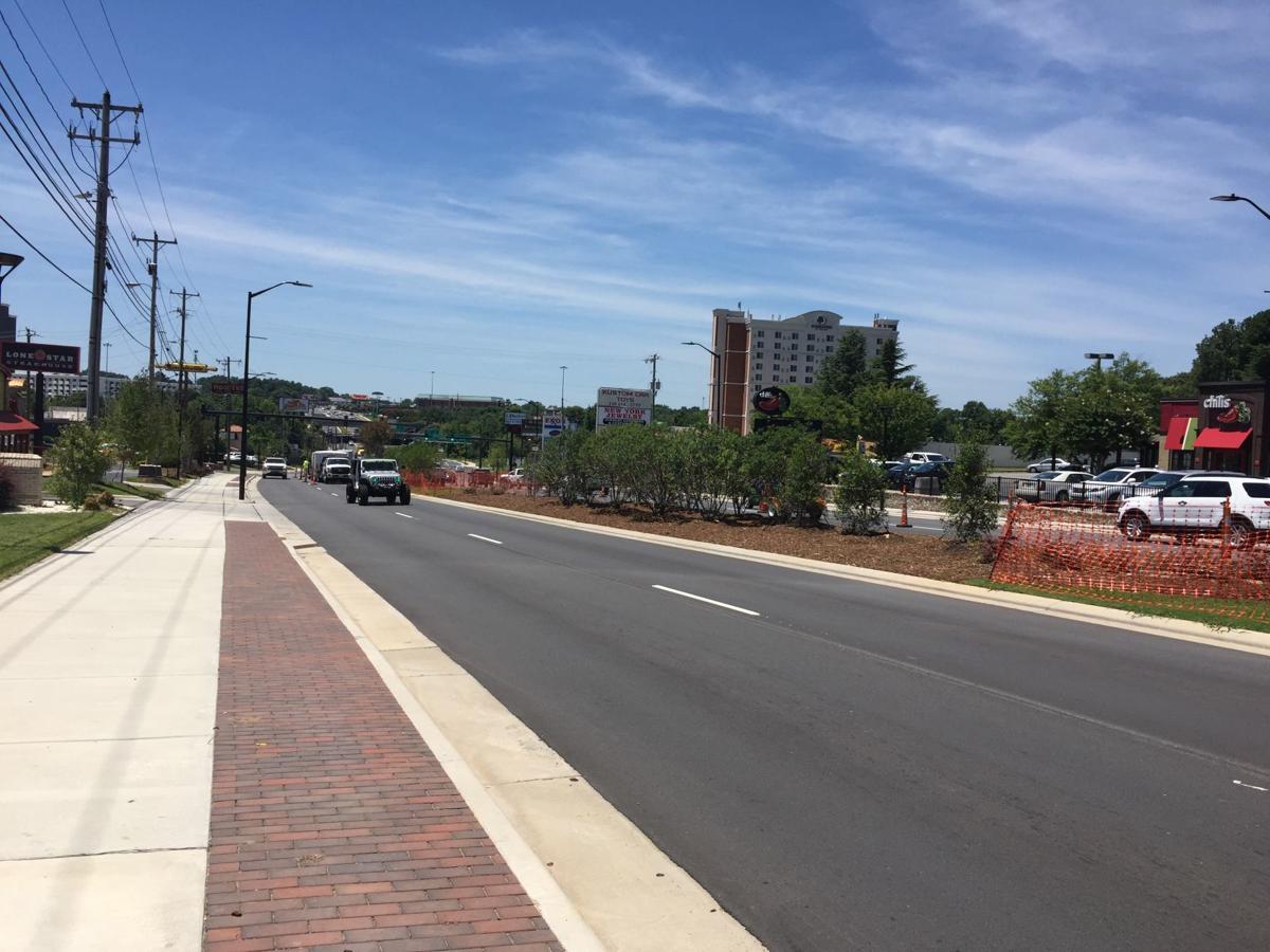 Gate City Boulevard shopping center gets new owner