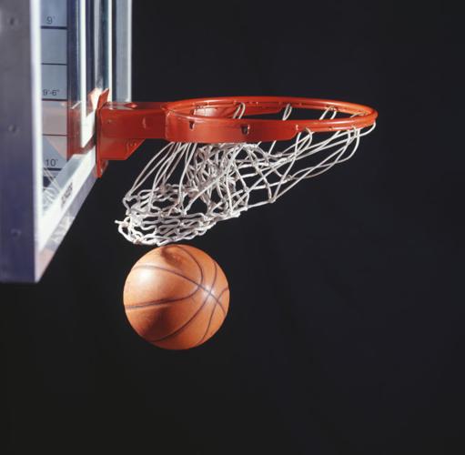 Basketball in hoop, close-up