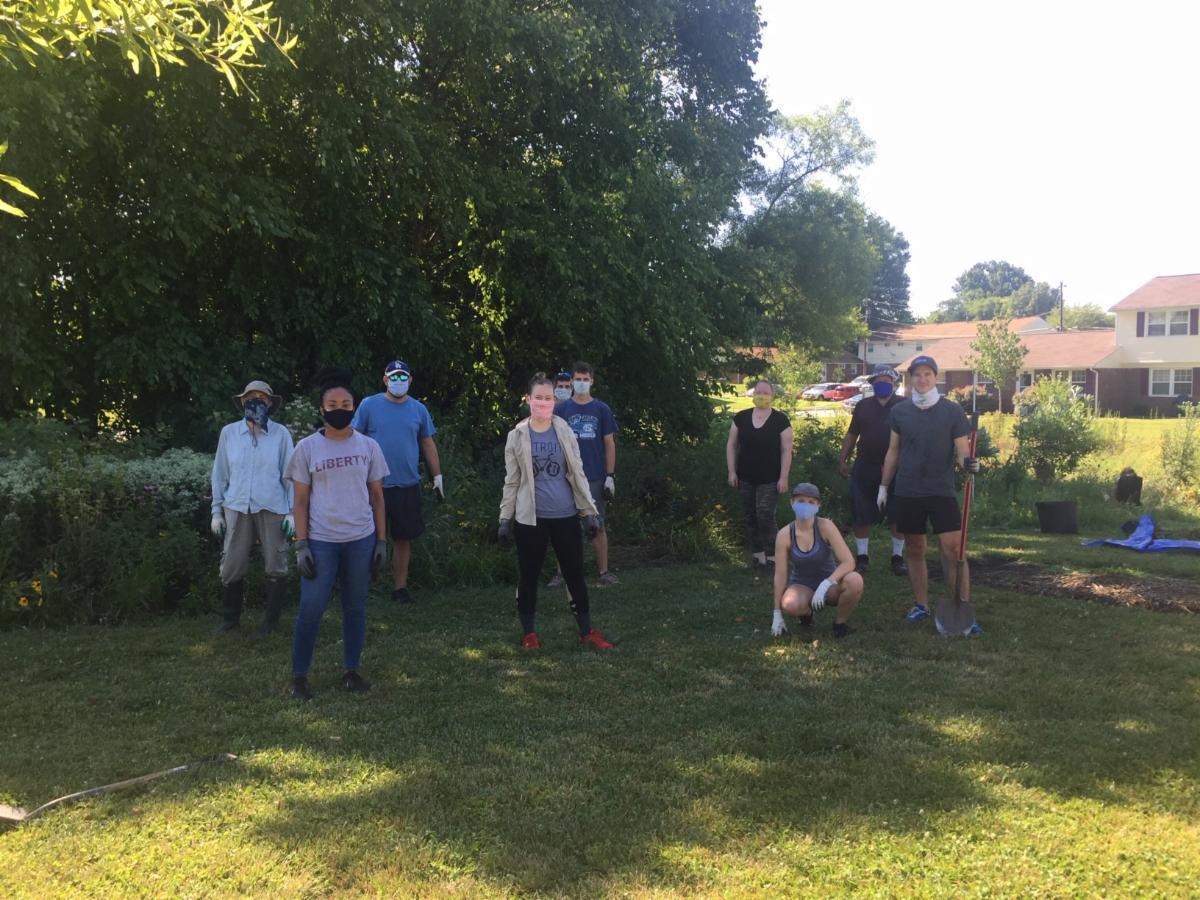 Volunteers clean the Bird, Bee & Butterfly Pollinator Garden
