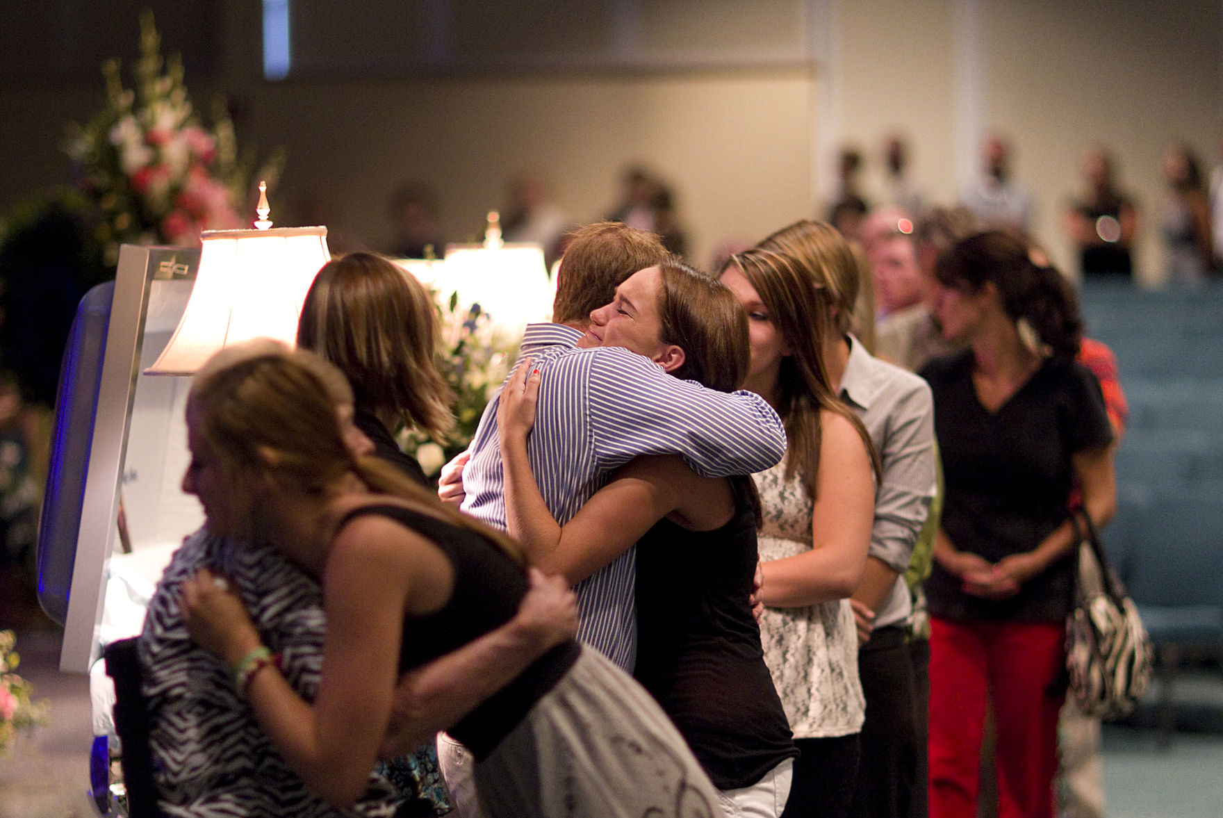 Hundreds console sisters family