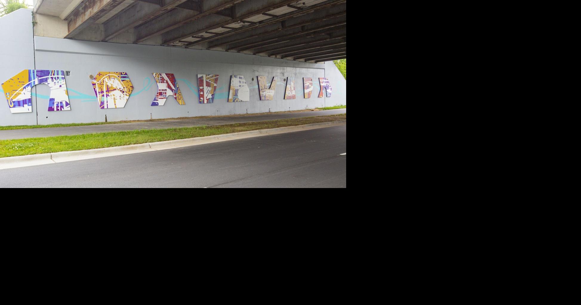 Artist adds a nontraditional mural to Greensboro's Downtown Greenway