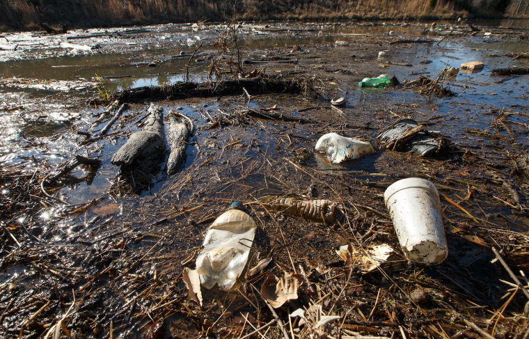 Lake trash returns to Archdale culvert