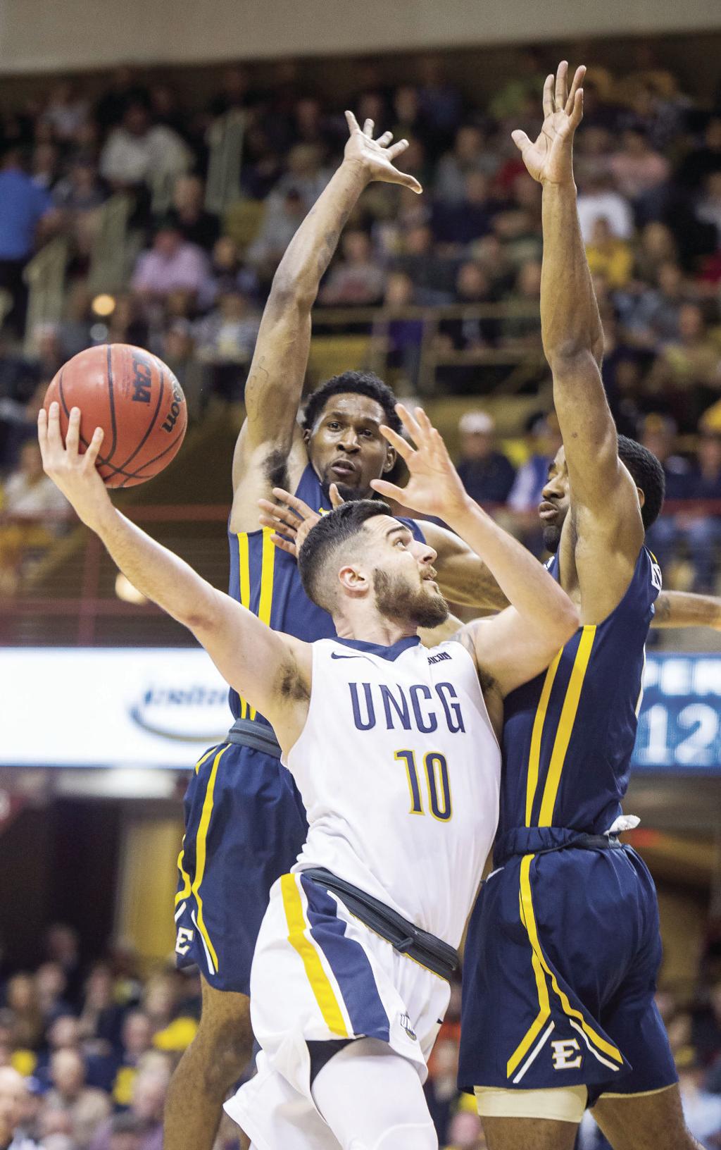 Going To The Dance Is What It S All About Uncg Climbs The Mountain Wins Southern Conference Tournament Latest News Greensboro Com