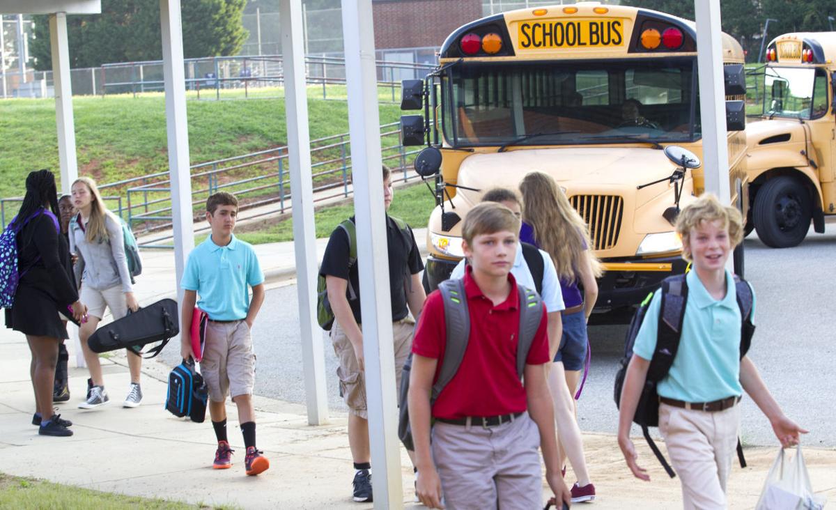 First day jitters, staff cuts keep Guilford teacher assistants busy