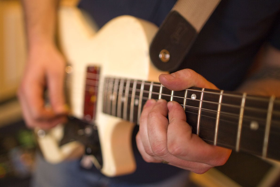 Musician gives new life to old guitars