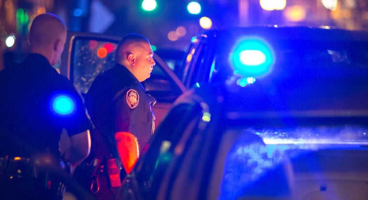 Greensboro police officer blue lights