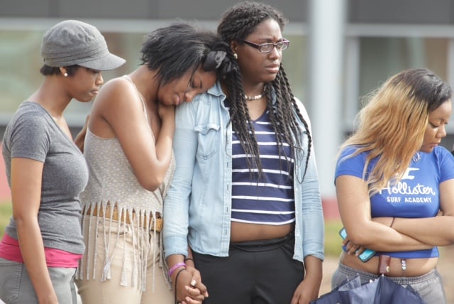 NCAT homicide vigil young adults 043014