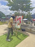 Block party celebrates new mural and green space