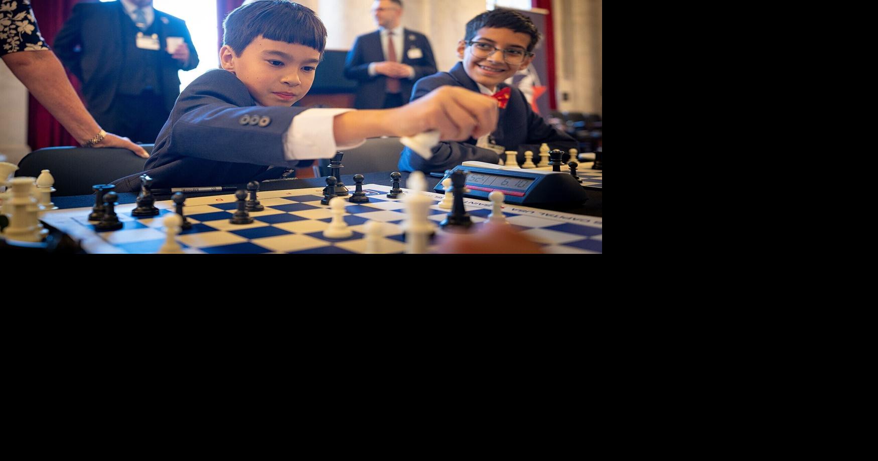 Teddy Mazur, 8, participates in the chess tournament