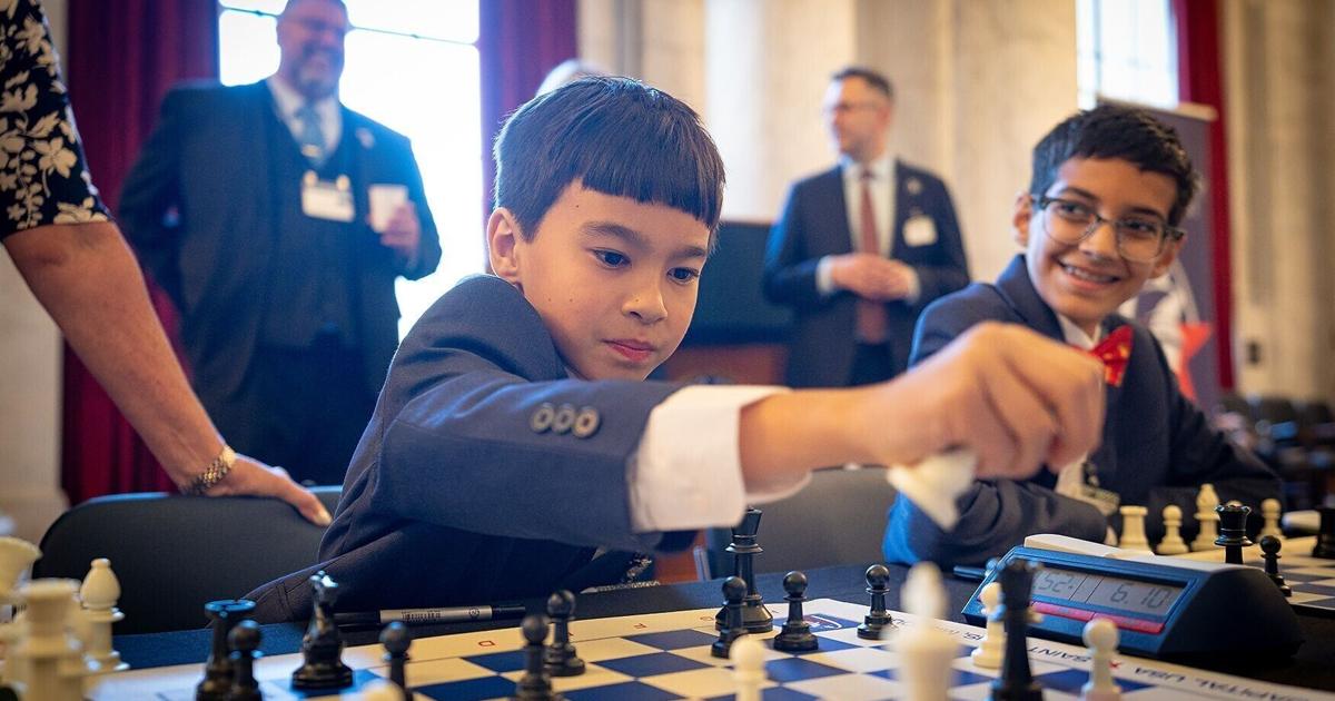 Teddy Mazur, 8, participates in the chess tournament