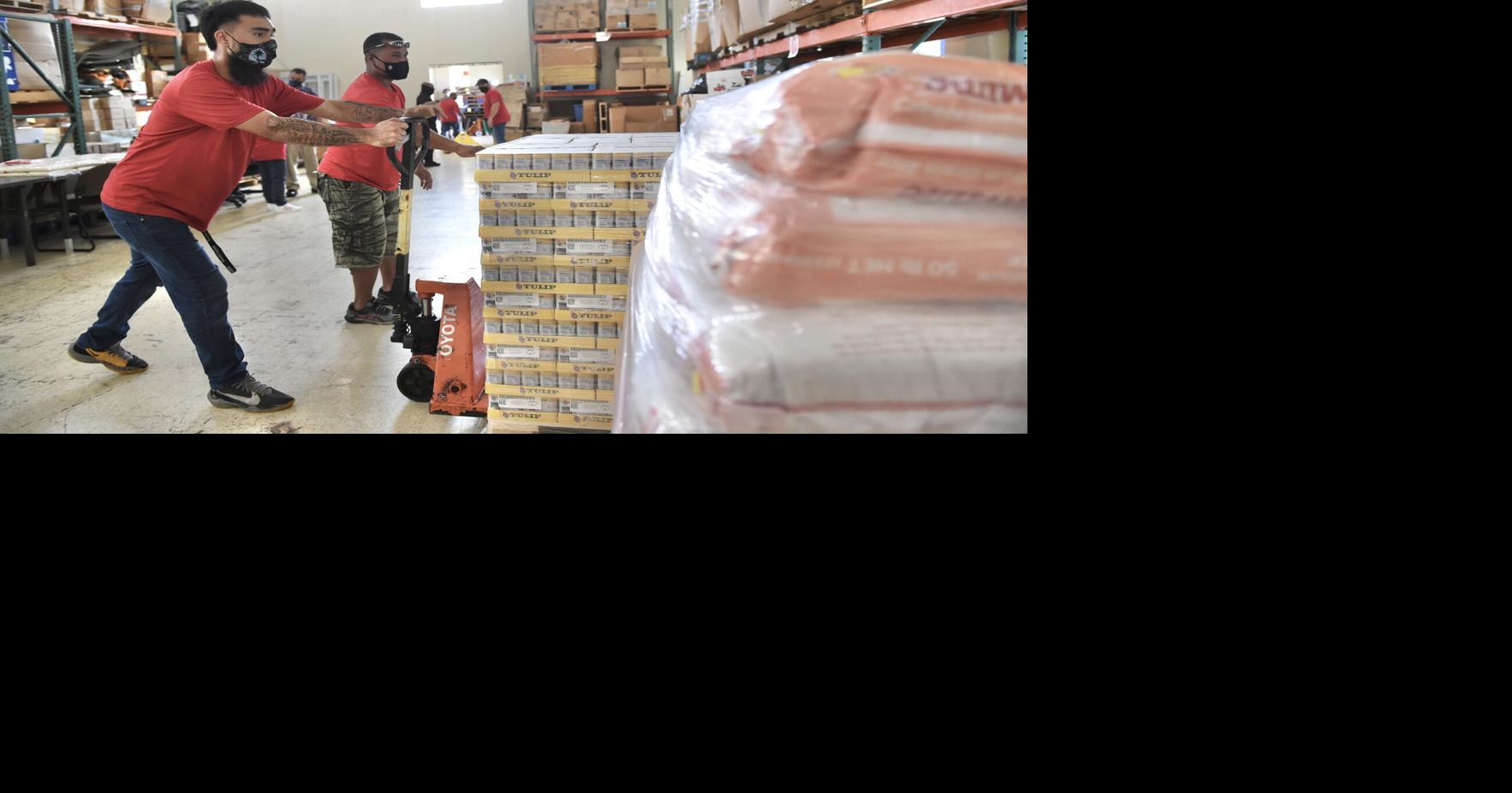 Quality Distributors makes annual Thanksgiving donation to The