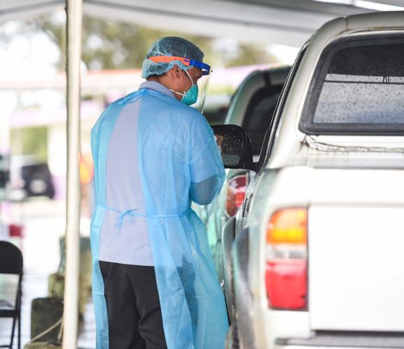 Southern residents receive free COVID-19 community test in Agat | Local ...