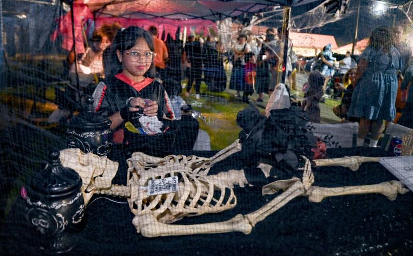 Ghouls and superheroes attend the Halloween TrickorTreating event