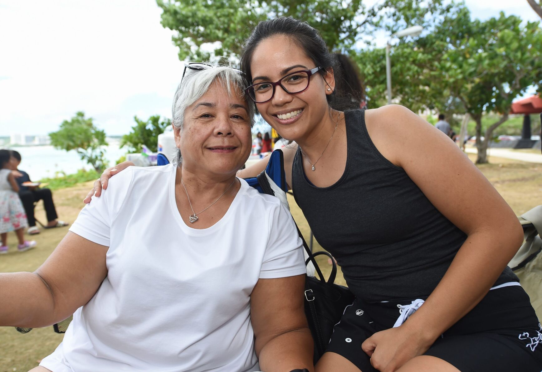 Beachgoers discuss the impact of their mothers