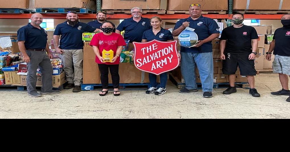 Businesses Make a Difference ECC gives to Salvation Army Money