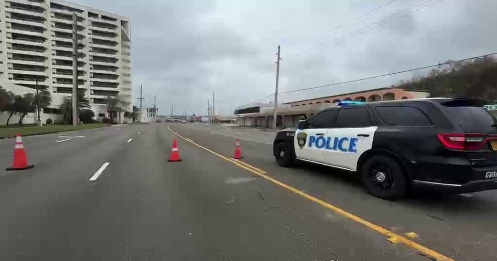 WATCH: DPW cleans up Sinlaku debris-filled portion of Marine Corps Drive before it can reopen | News | guampdn.com