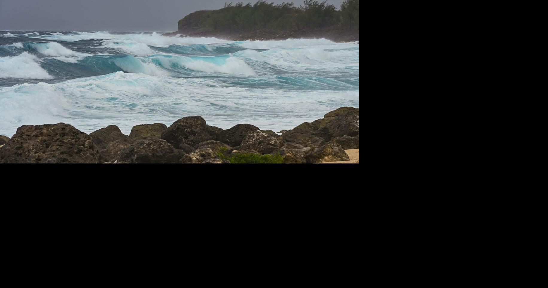 WRAP-UP: Guam hunkers down for Super Typhoon Sinlaku, though it may be spared the worst