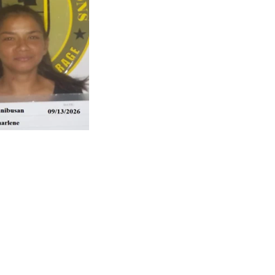 Woman accused of hitting officer, trying to kick police