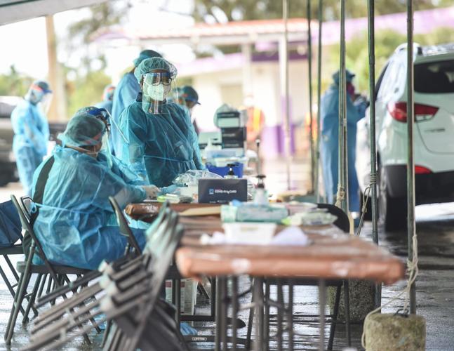 Southern residents receive free COVID-19 community test in Agat | Local ...