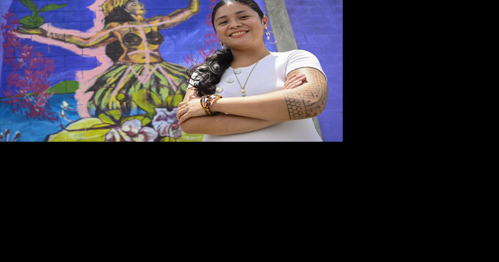 Artist Gera Datuin creates a mural for Sinajana | Multimedia | guampdn.com