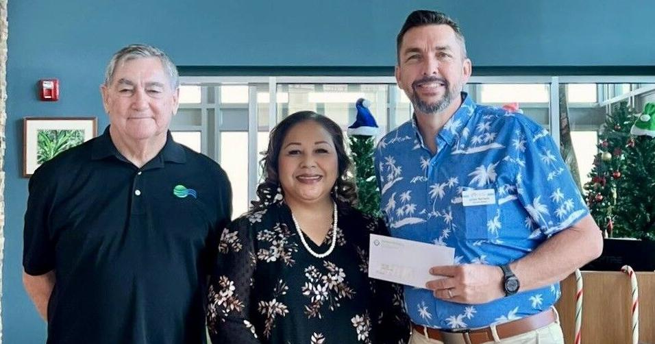 Marianas Finance donates $10K to support Harvest House