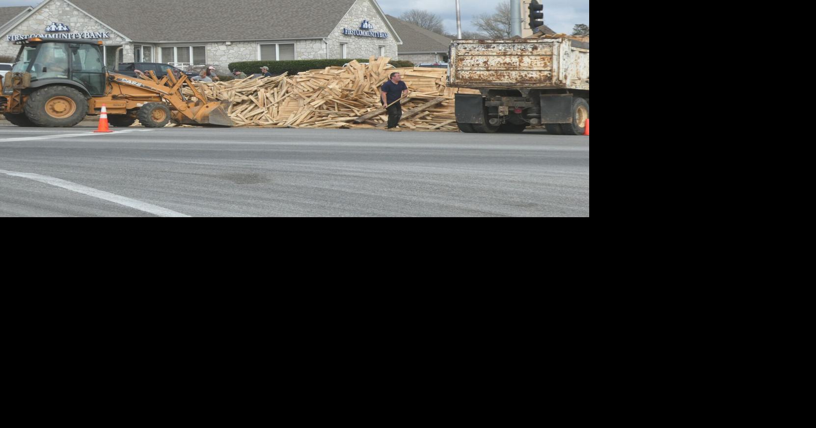 Lumber load tumps, causes traffic jam | News | guardonline.com