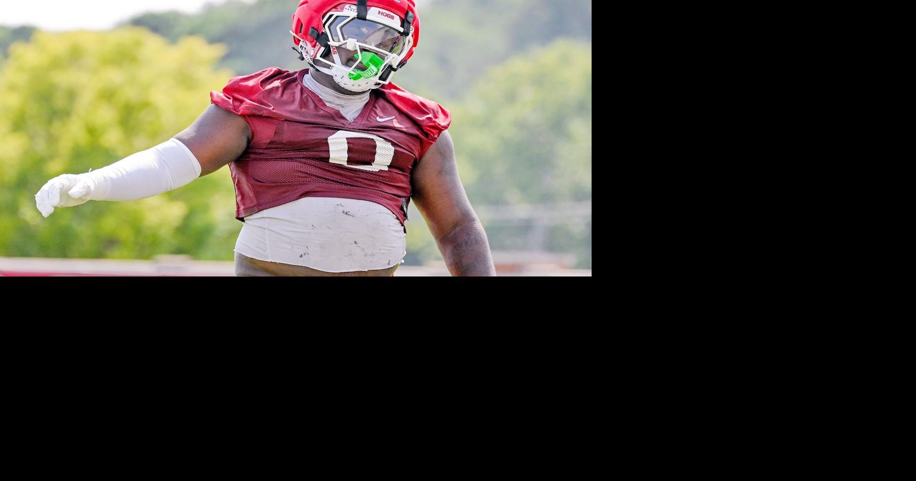 Razorbacks hit field for first football practice