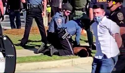 Four Arrested Two Police Cars Damaged During Protests At
