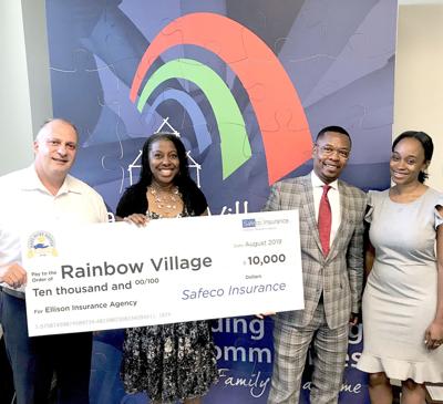 Rainbow Village Gets 10 000 Donation From Safeco Insurance Ellison Insurance Agency News Gwinnettdailypost Com