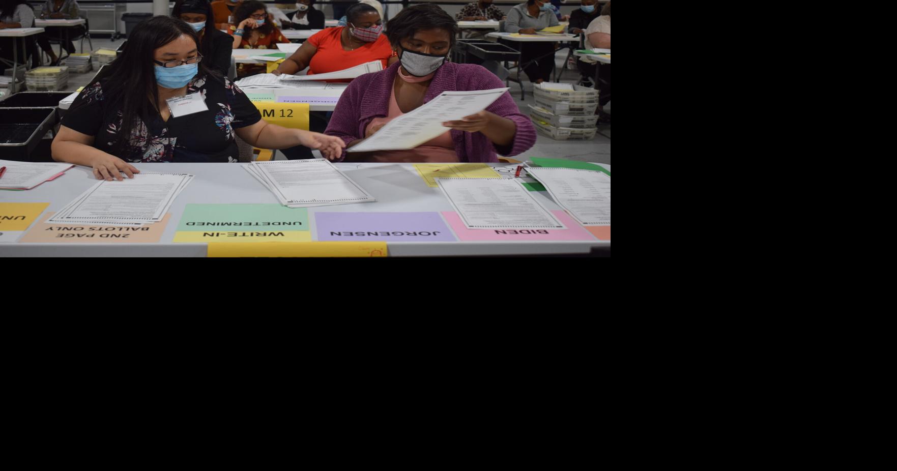 PHOTOS: Presidential election hand recount gets underway in Gwinnett ...