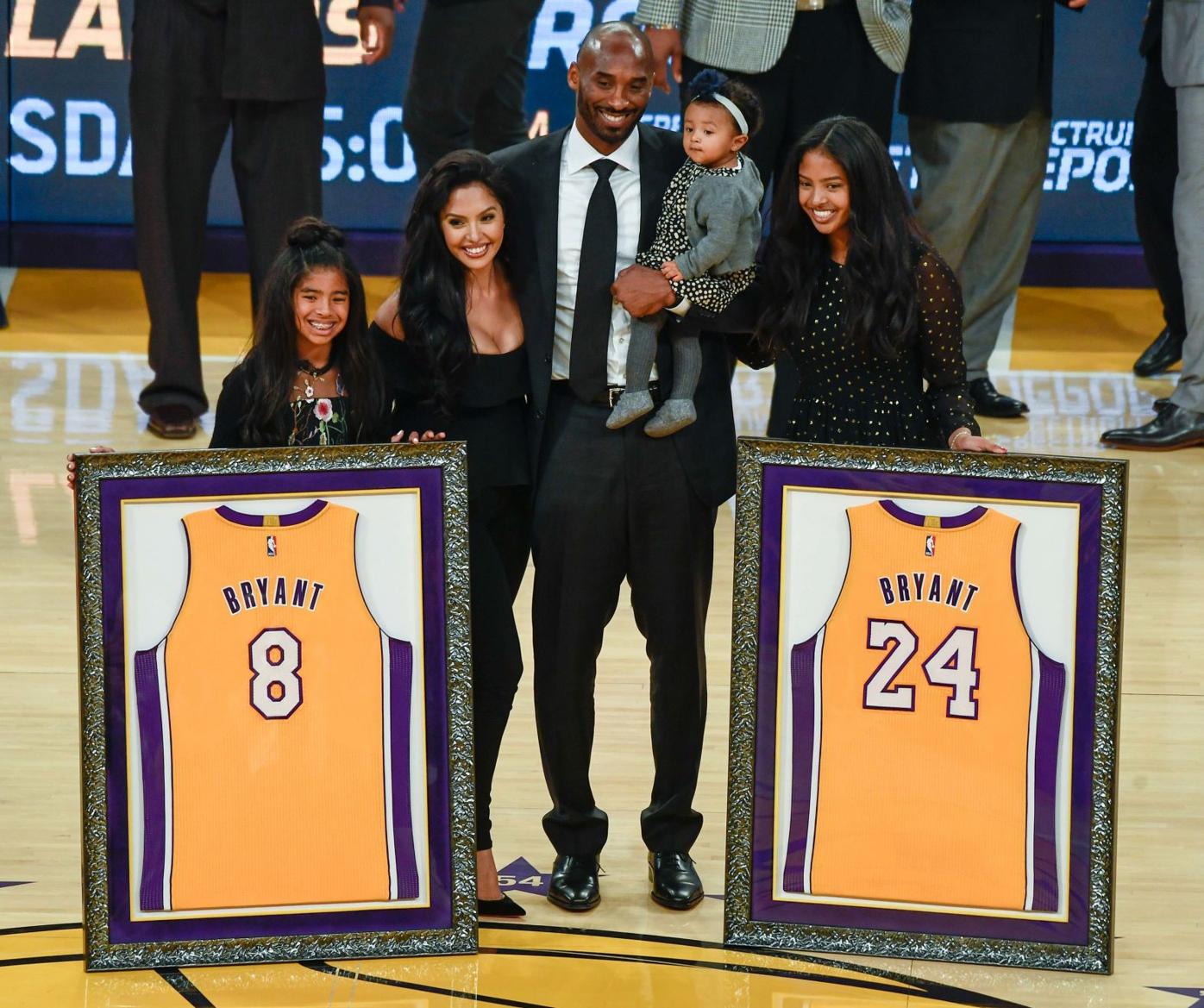 Magic Johnson & Kobe Bryant during Bryant's jersey retirement ceremony on  December 18, 2017 at STAPLES Center in Los Angeles, California Photo Print  