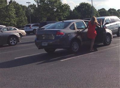 Woman finds man hiding in car near Buford TJ Maxx Buford