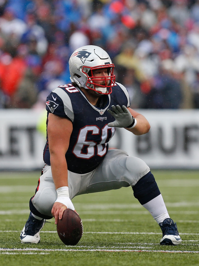 New England Patriots center David Andrews (60) walks off the field