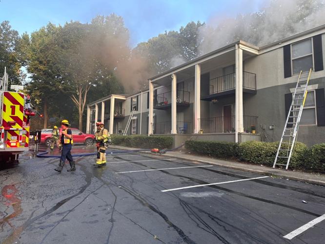 Gwinnett firefighters rescue four people from apartment fire | News ...
