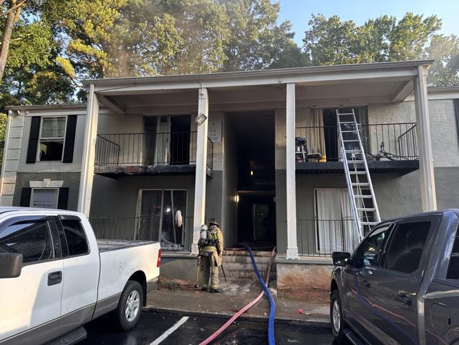 Gwinnett firefighters rescue four people from apartment fire | News ...