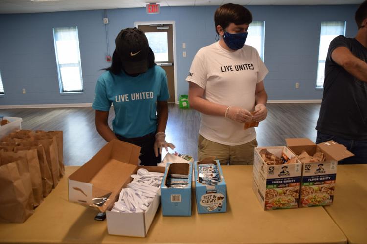 PHOTOS: United Way volunteers make meals for HomeFirst Gwinnett shelter ...