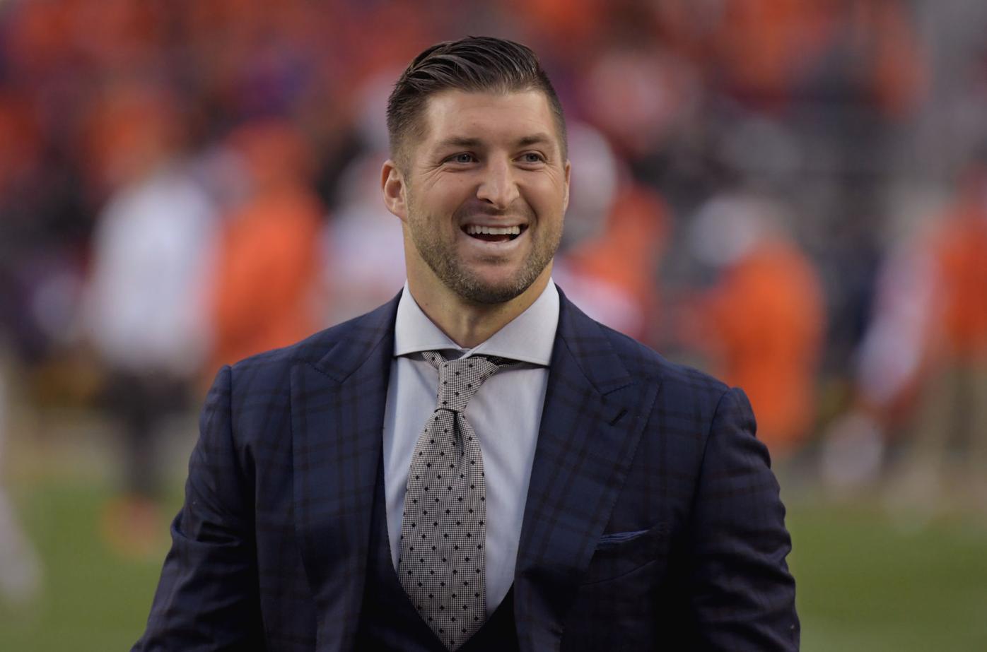 Demi-Leigh Nel-Peters Surprises Tim Tebow with High School Jersey