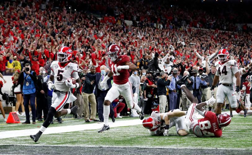 CFP National Championship Notebook: Kelee Ringo's record-breaking moment  caps UGA win, Sports