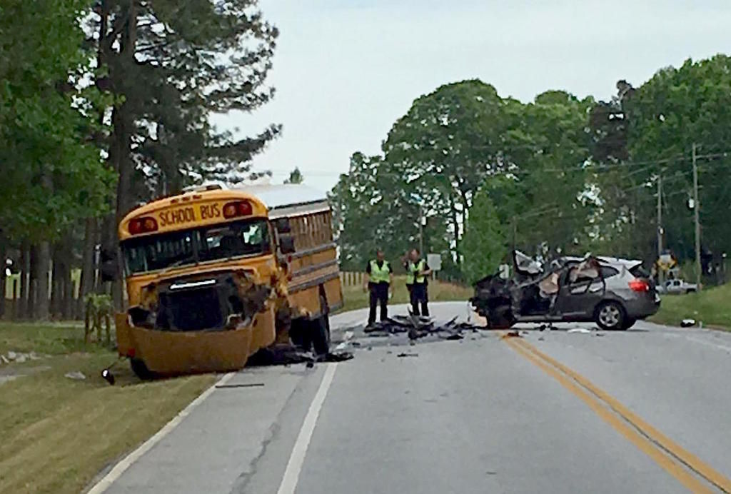 Driver seriously injured after collision with school bus ...