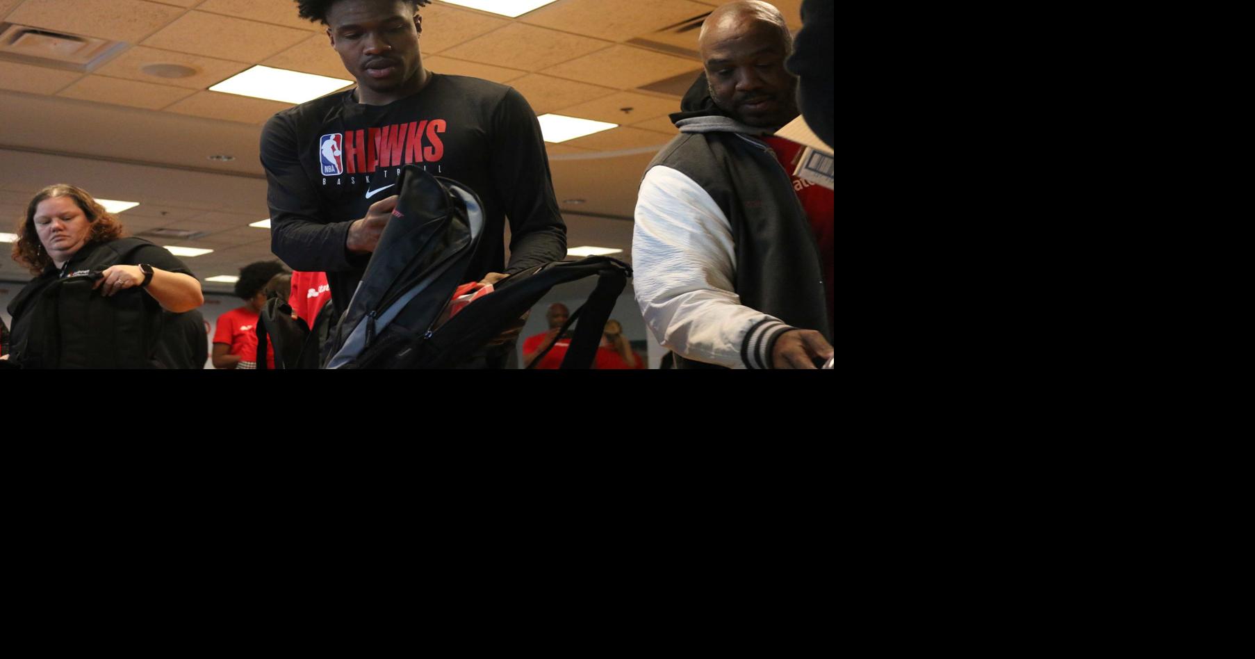 Norcross grad and Atlanta Hawk Brandon Goodwin helps stuff 1,000 ...