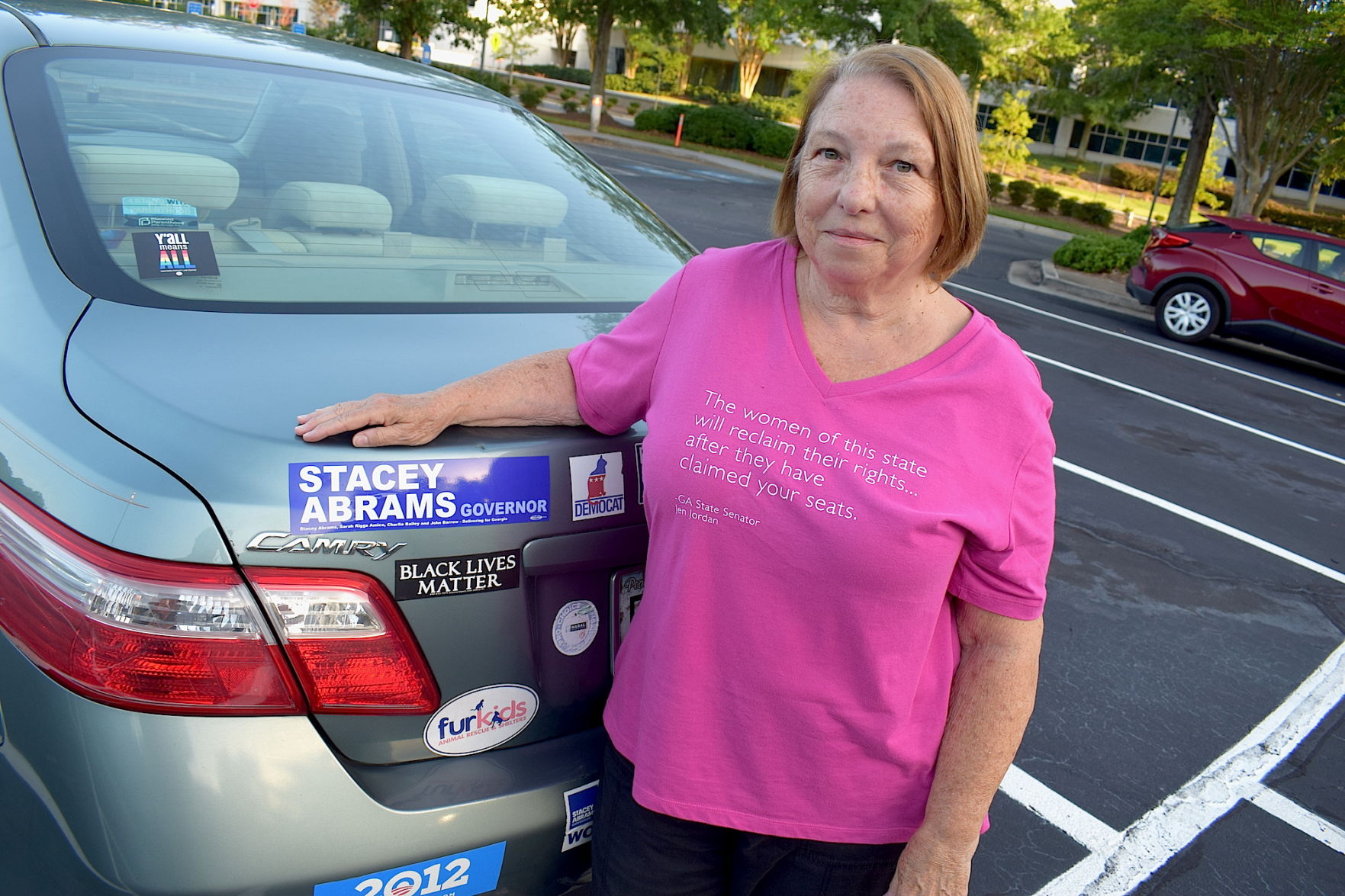 Man accused of placing Trump stickers on car of local Democrat