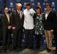 Brian McCann and his wife Ashley McCann at a news conference at