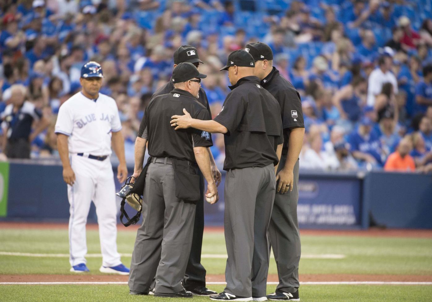 MLB umpires may get on-field microphones to explain replay review