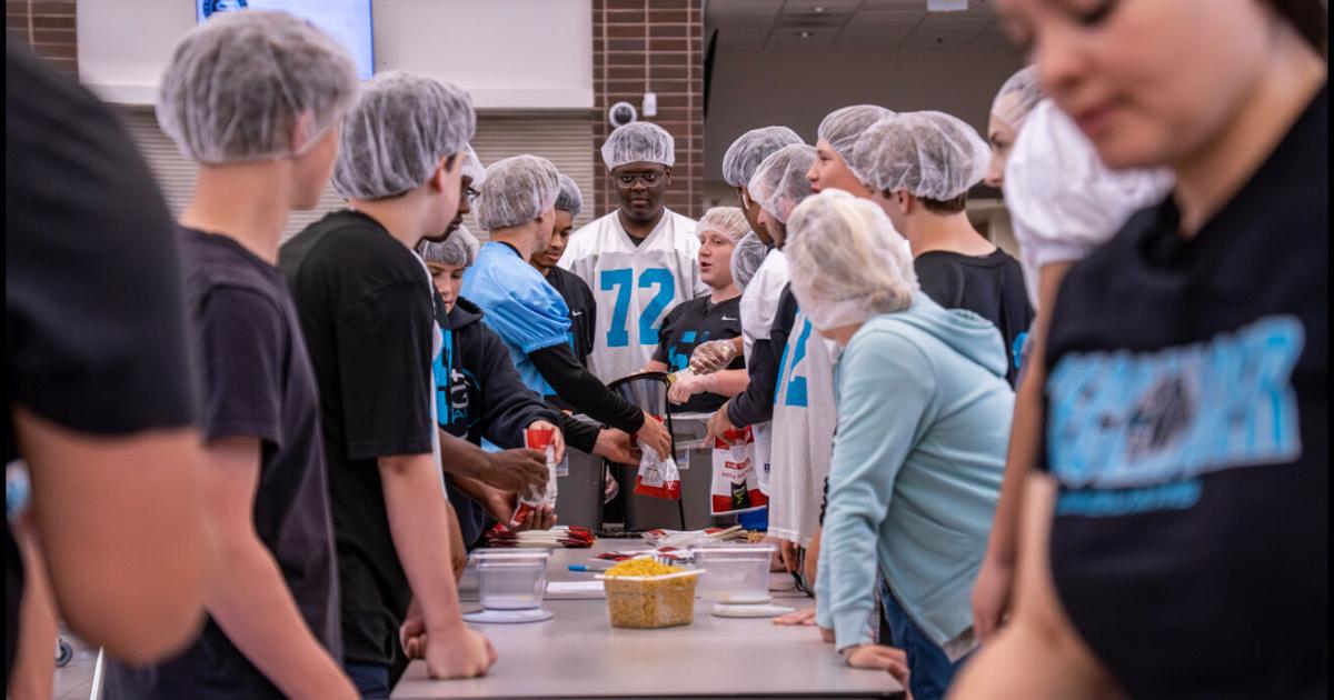 Seckinger High football team putting servant leadership 'into action'