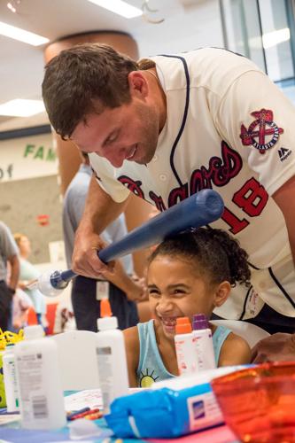 Francoeurs, Braves make annual stop at children's hospital for Christmas in  July event, News