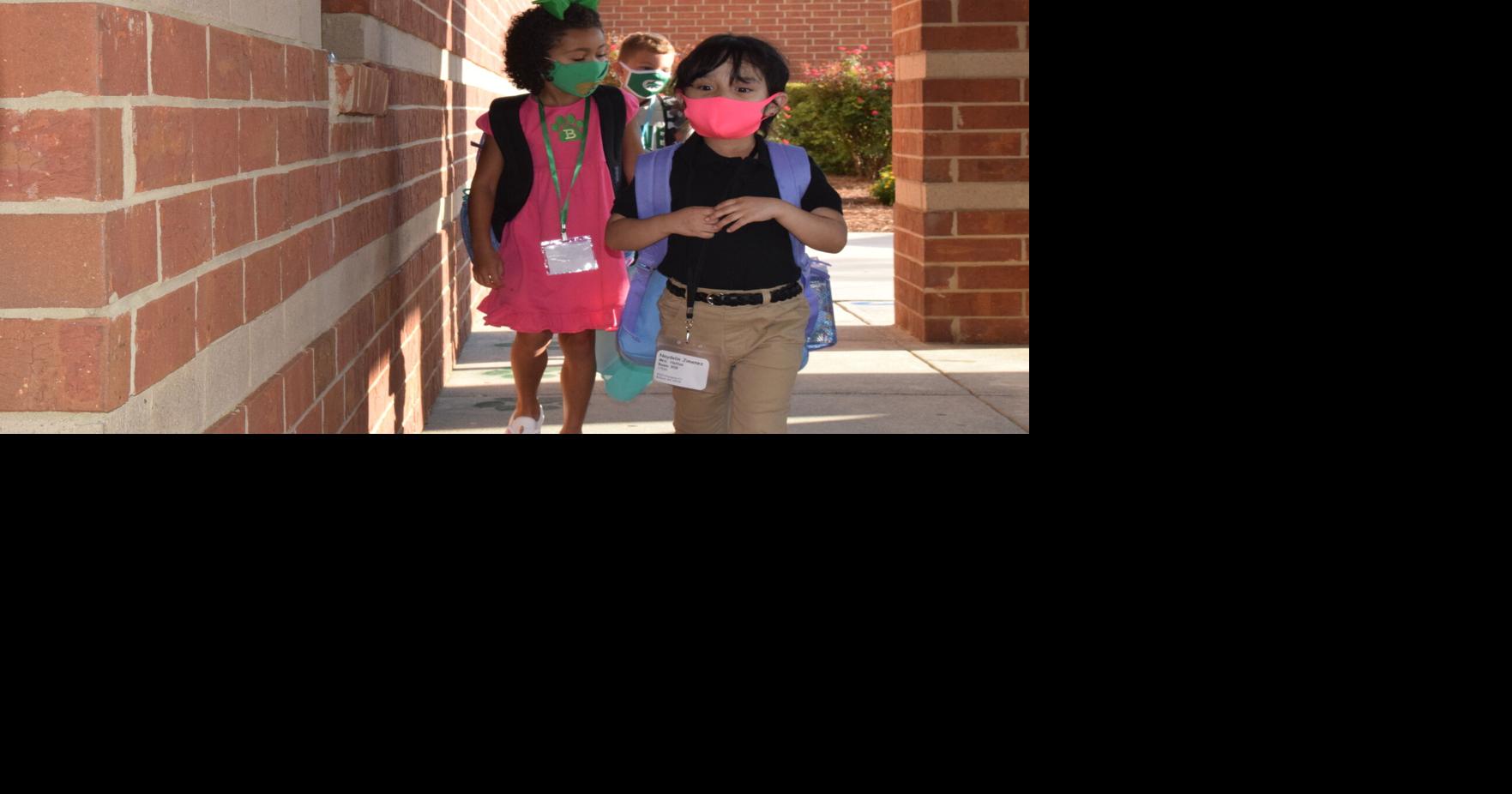 County students head back to school as COVID looms over third