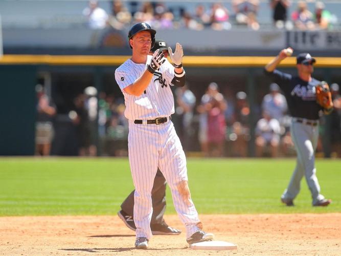 Chicago White Sox Third Baseman Todd Frazier takes a swing at a