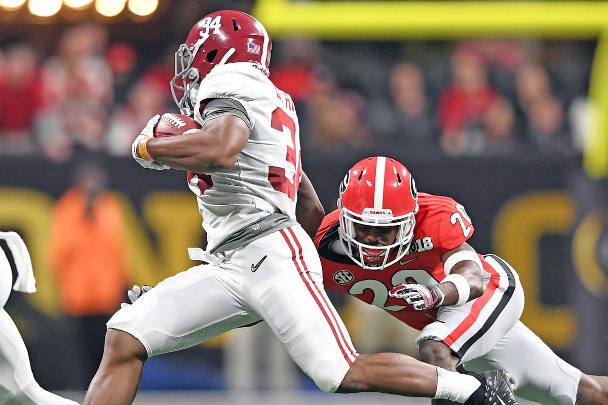 PHOTOS vs. Alabama National Championship game Slideshows