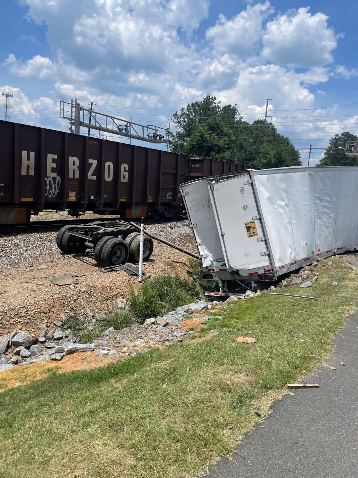 Suwanee Dam Road reopened at Buford Highway after train hit tractor
